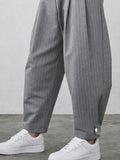 Vertical Striped Pants with Button Cuff Detail